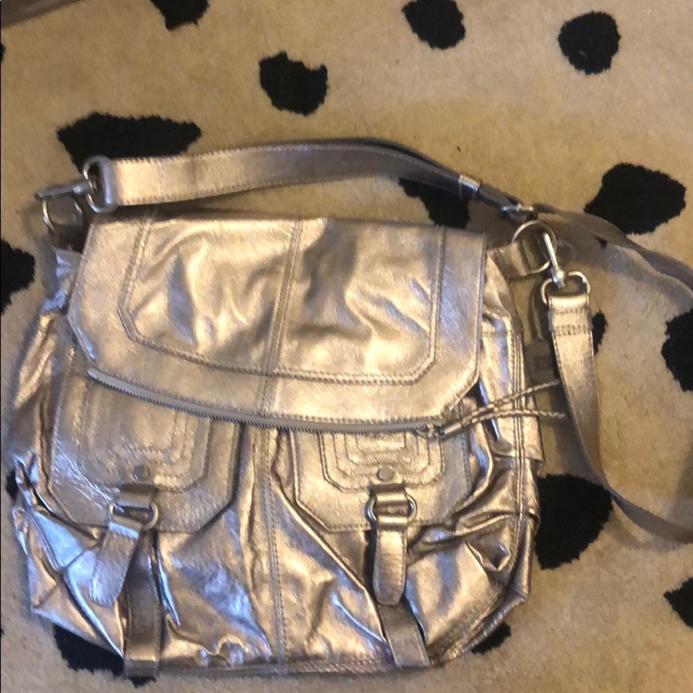 The Sak crossbody champagne colored leather bag